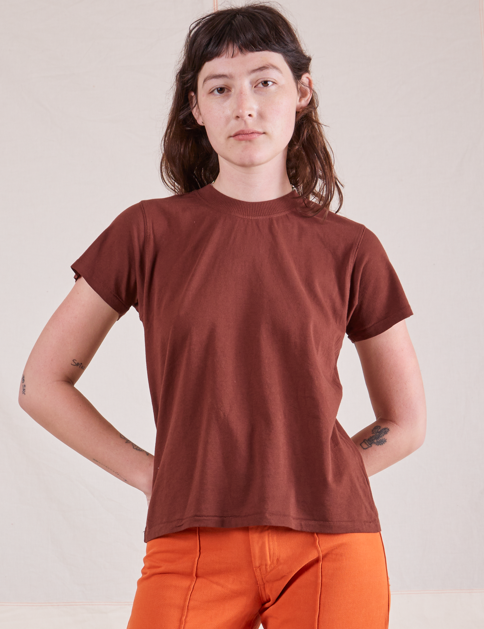 Alex is wearing P Organic Vintage Tee in Fudgesicle Brown