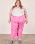 Catie is 5'11" and wearing size 5XL Western Pants in Bubblegum Pink paired with Tank Top in vintage tee off-white