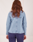 Back view of Indigo Denim Work Jacket in Light Wash worn by Alex