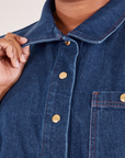 Indigo Denim Work Jacket in Dark Wash front close up on Morgan holding collar point