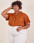 Morgan is wearing Pantry Button-Up in Burnt Terracotta tucked into vintage tee off-white Western Pants