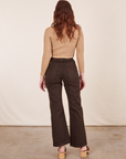 Back view of Western Pants in Espresso Brown paired with tan Essential Turtleneck worn by Alex
