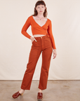 Alex is 5'8" and wearing XS Work Pants in Burnt Terracotta