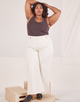 Morgan is 5'5" and wearing 1XL Bell Bottoms in Vintage Tee Off-White paired with espresso brown Tank Top