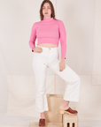 Allison is wearing Essential Turtleneck in Bubblegum Pink and vintage tee off-white Western Pants