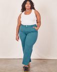 Morgan is 5'5" and wearing size 1XL Work Pants in Marine Blue paired with Tank Top in vintage tee off-white