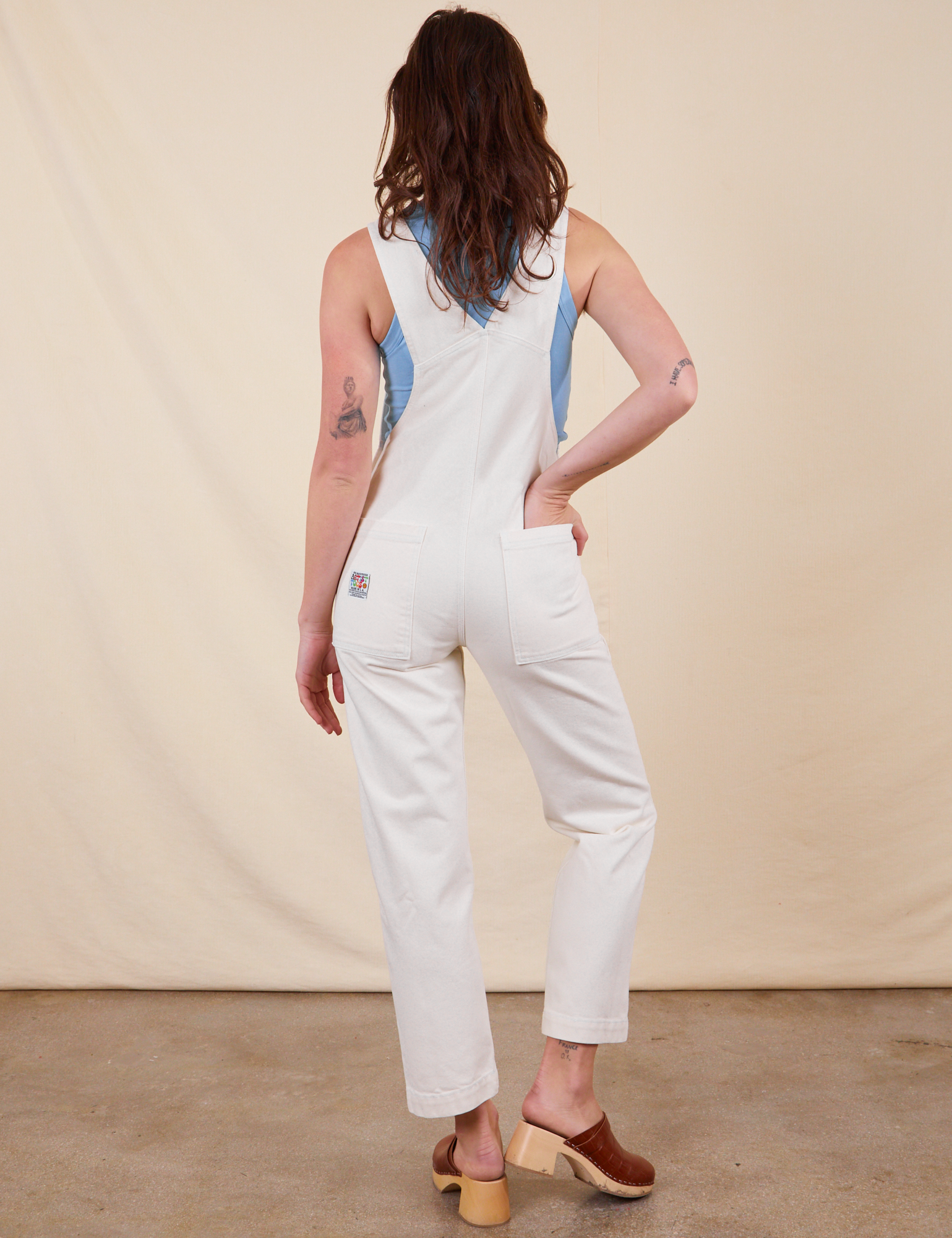 Back view of Original Overalls in Vintage Tee Off-White worn by Alex