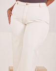 Front close up of Bell Bottoms in Vintage Tee Off-White worn by Morgan