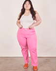 Ashley is 5'7" and wearing 1XL Work Pants in Bubblegum Pink paired with Tank Top in vintage tee off-white