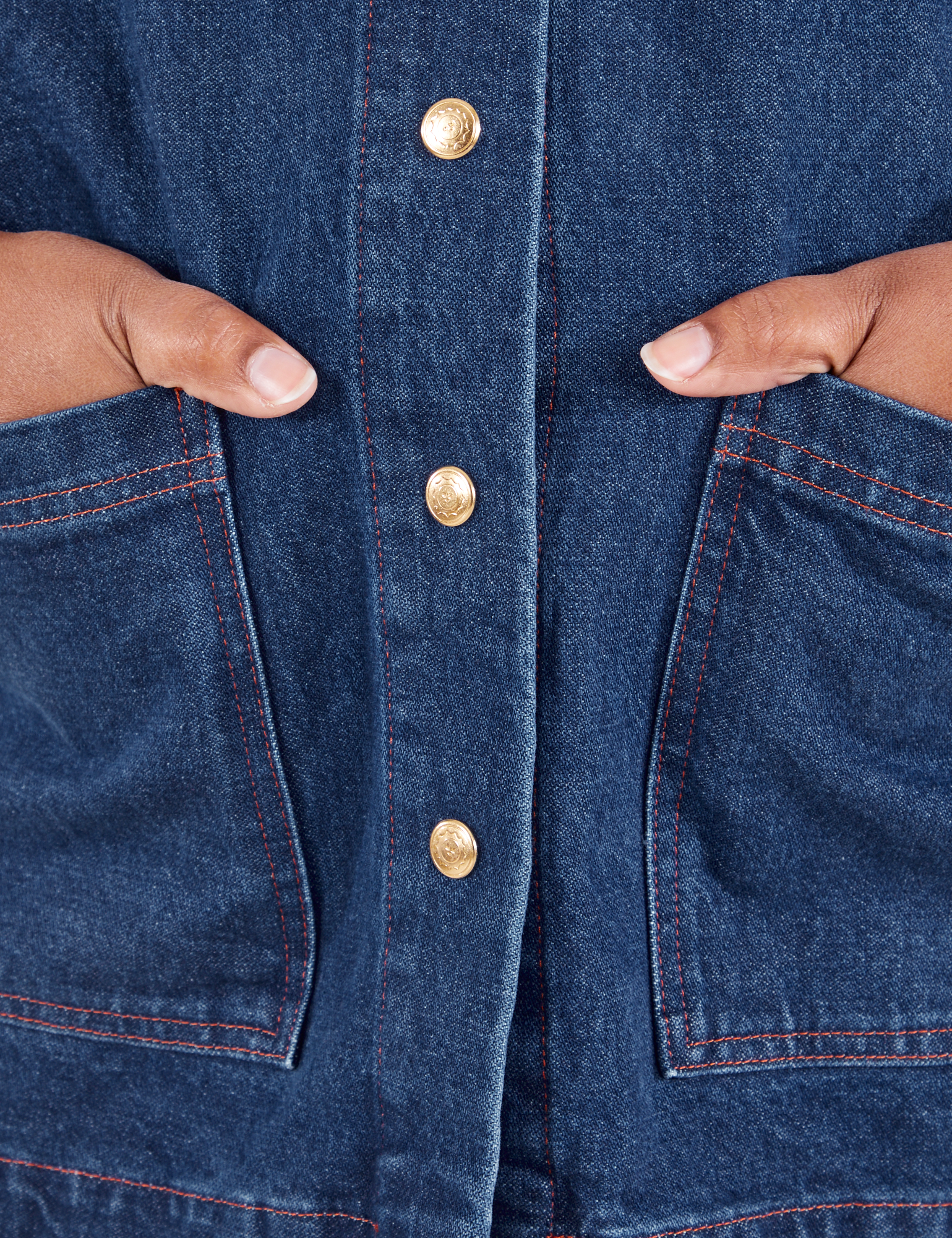 Indigo Denim Work Jacket in Dark Wash hand in front two pockets close up on Morgan