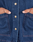 Indigo Denim Work Jacket in Dark Wash hand in front two pockets close up on Morgan