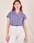 Alex is wearing P Pantry Button-Up in Faded Grape tucked into vintage tee off-white Western Pants