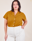 Faye is wearing M Pantry Button-Up in Spicy Mustard tucked into vintage tee off-white Western Pants
