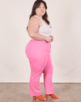 Work Pants in Bubblegum Pink side view on Ashley wearing Tank Top in vintage tee off-white