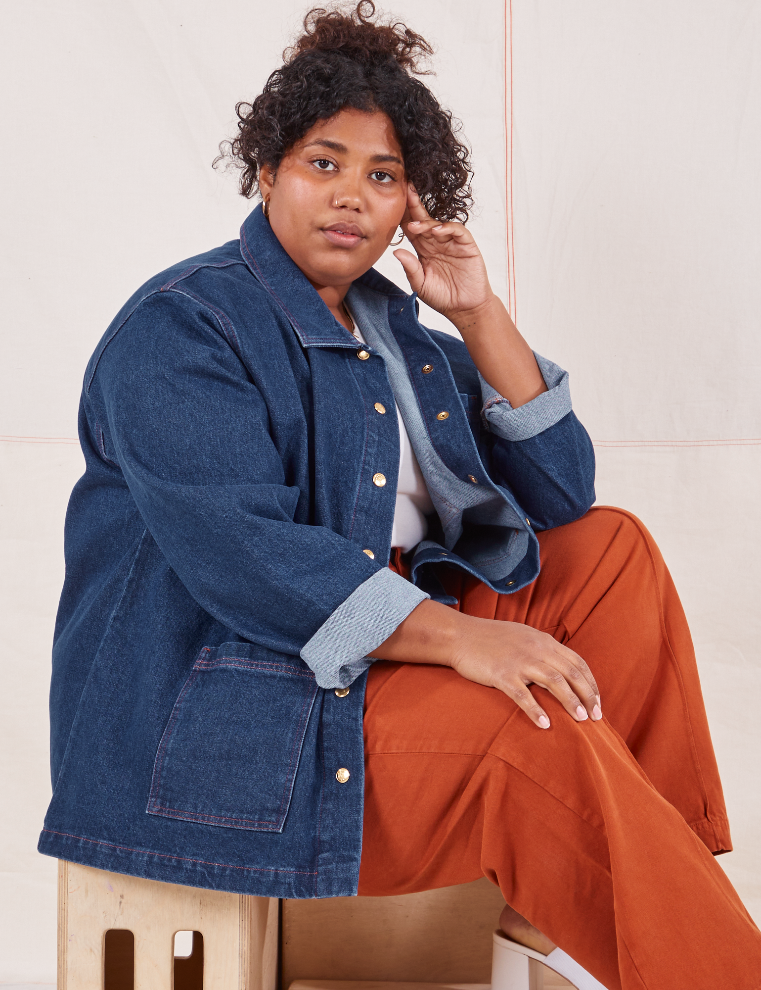 Side view of Indigo Denim Work Jacket in Dark Wash worn by Morgan