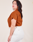 Side view of Pantry Button-Up in Burnt Terracotta worn by Faye