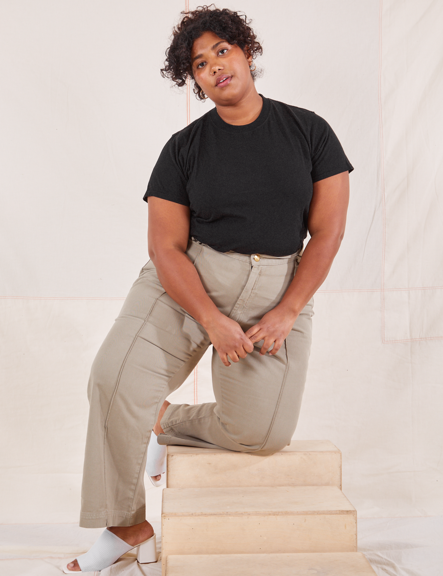 Morgan is wearing Organic Vintage Tee in Basic Black and khaki grey Western Pants