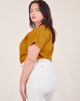 Side view of Pantry Button-Up in Spicy Mustard worn by Faye