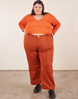 Sarita is 5'7" and wearing 3XL Western Pants in Burnt Terracotta