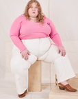 Catie is wearing Long Sleeve V-Neck Tee in Bubblegum Pink and vintage tee off-white Western Pants
