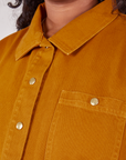 Denim Work Jacket in Spicy Mustard front close up showing custom baby sun brass buttons