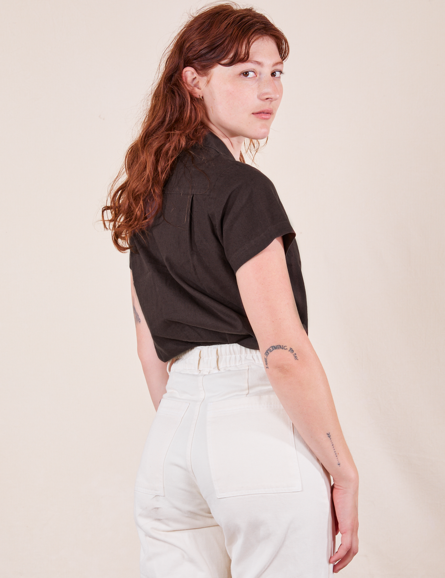 Angled back view of Pantry Button-Up in Espresso Brown worn by Alex