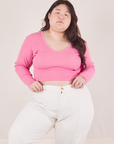 Ashley is wearing size L  Long Sleeve V-Neck Tee in Bubblegum Pink paired with vintage tee off-white Western Pants