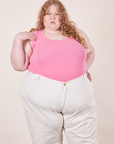 Catie is wearing 3XL Tank Top in Bubblegum Pink paired with vintage off-white Western Pants