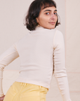 Back view of Essential Turtleneck in Vintage Off-White worn by Soraya