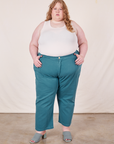 Catie is 5'11" and wearing 5XL Work Pants in Marine Blue paired with Tank Top in vintage tee off-white