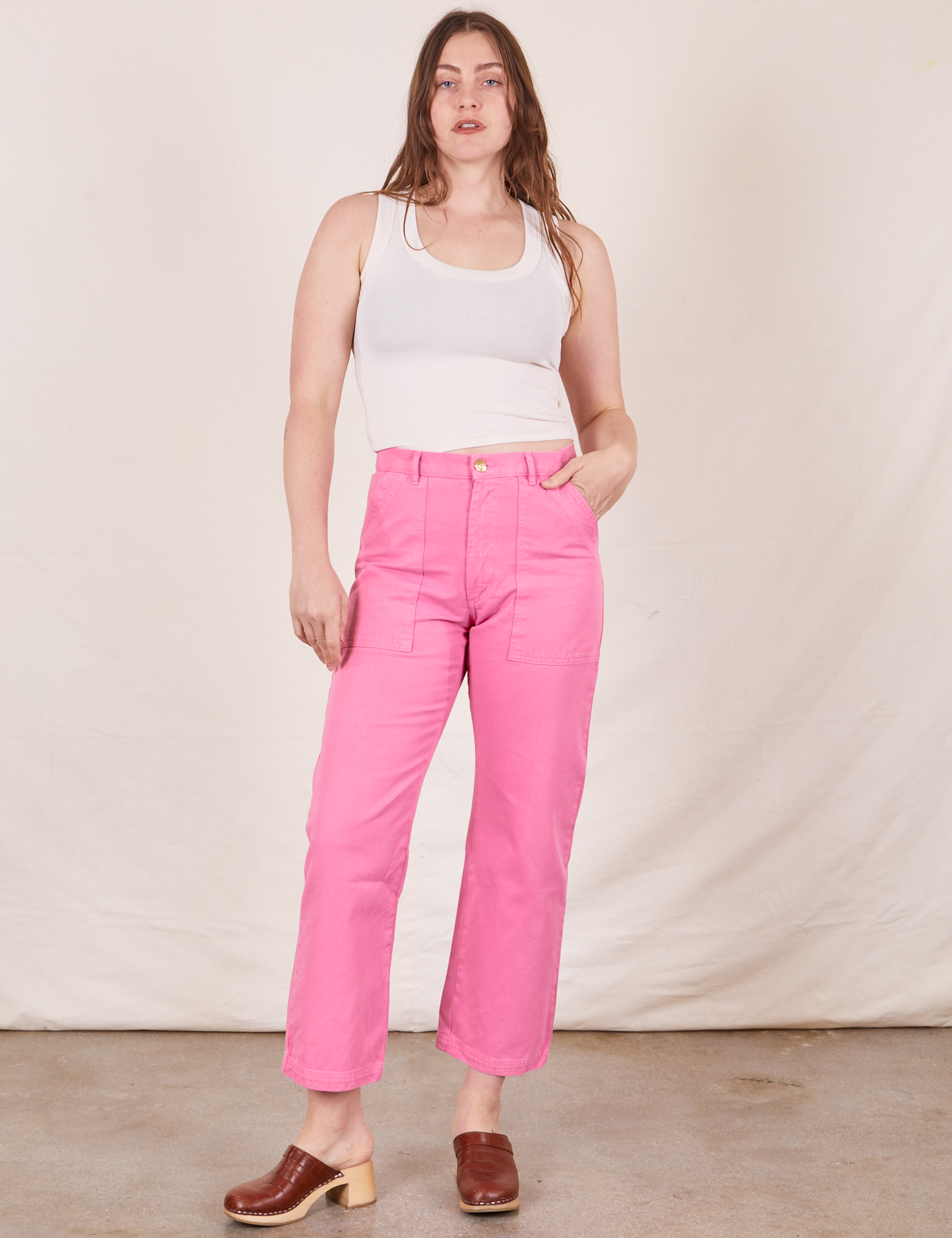 Allison is 5&#39;10&quot; and wearing size S Work Pants in Bubblegum Pink paired with Tank Top in vintage tee off-white