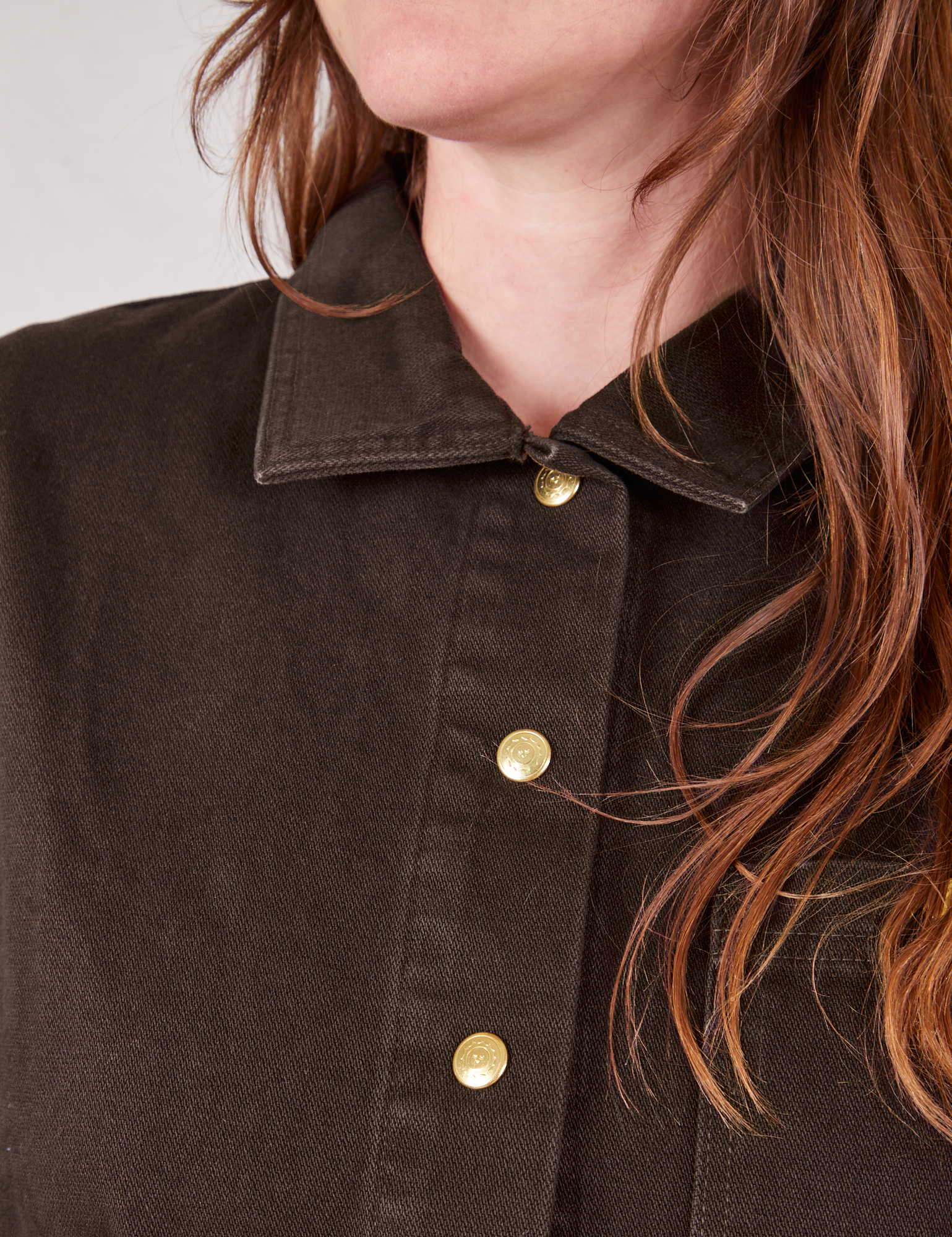 Denim Work Jacket in Espresso Brown front close up on Allison featuring sun baby brass buttons