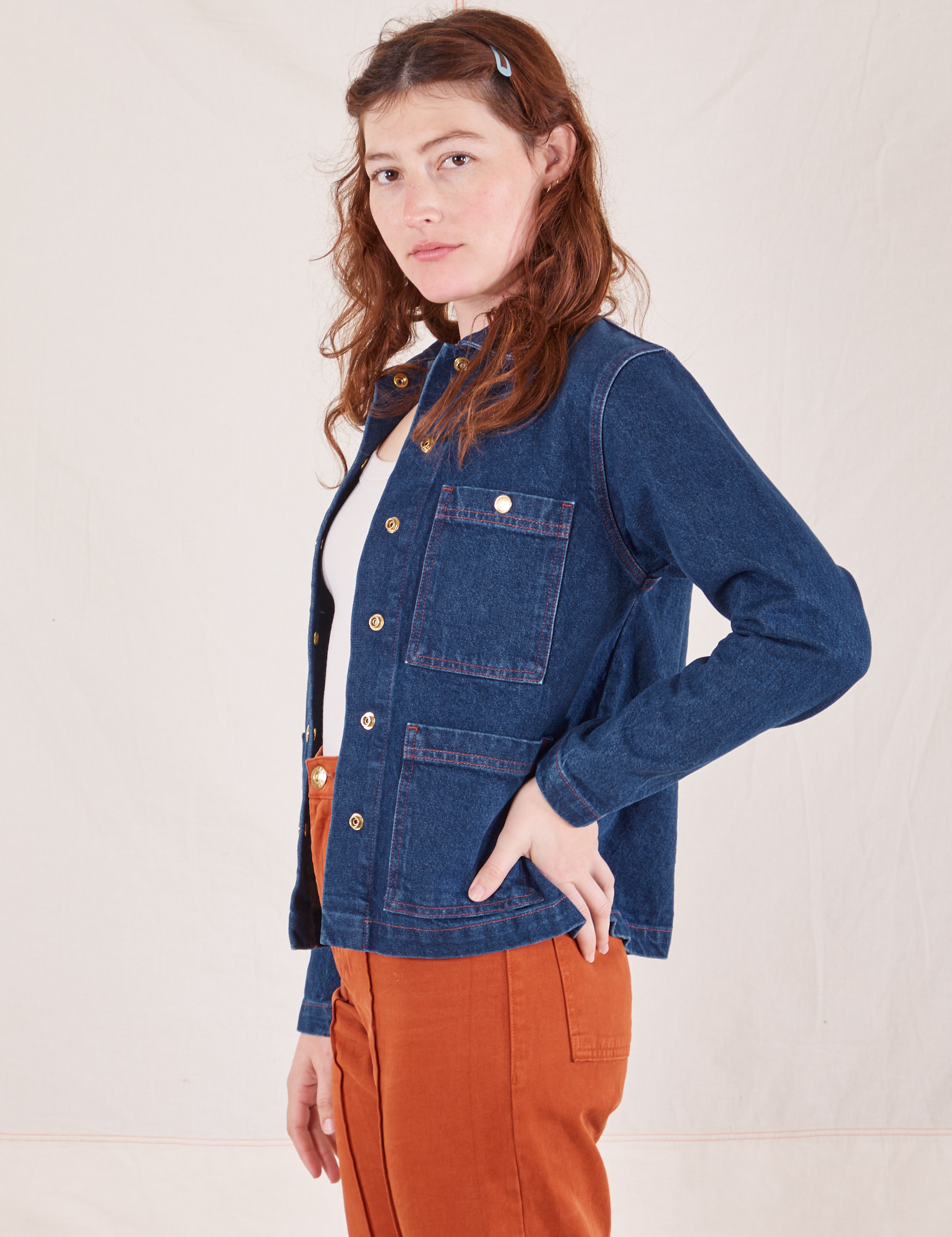 Side view of Indigo Denim Work Jacket in Dark Wash worn by Alex