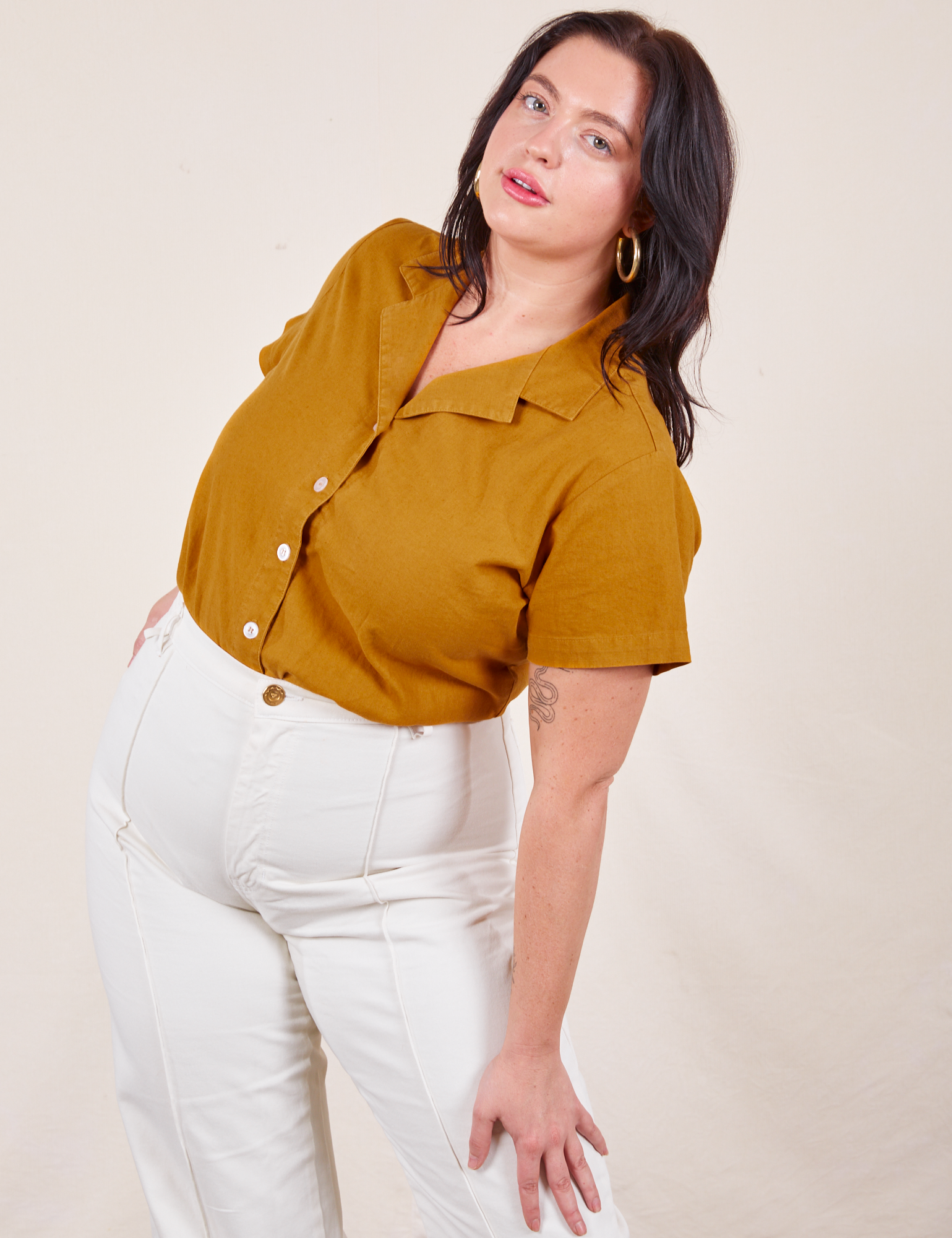 Faye is wearing Pantry Button-Up in Spicy Mustard and vintage tee off-white Western Pants