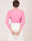 Wrap Top in Bubblegum Pink back view on Tiara wearing vintage tee off-white Western Pants