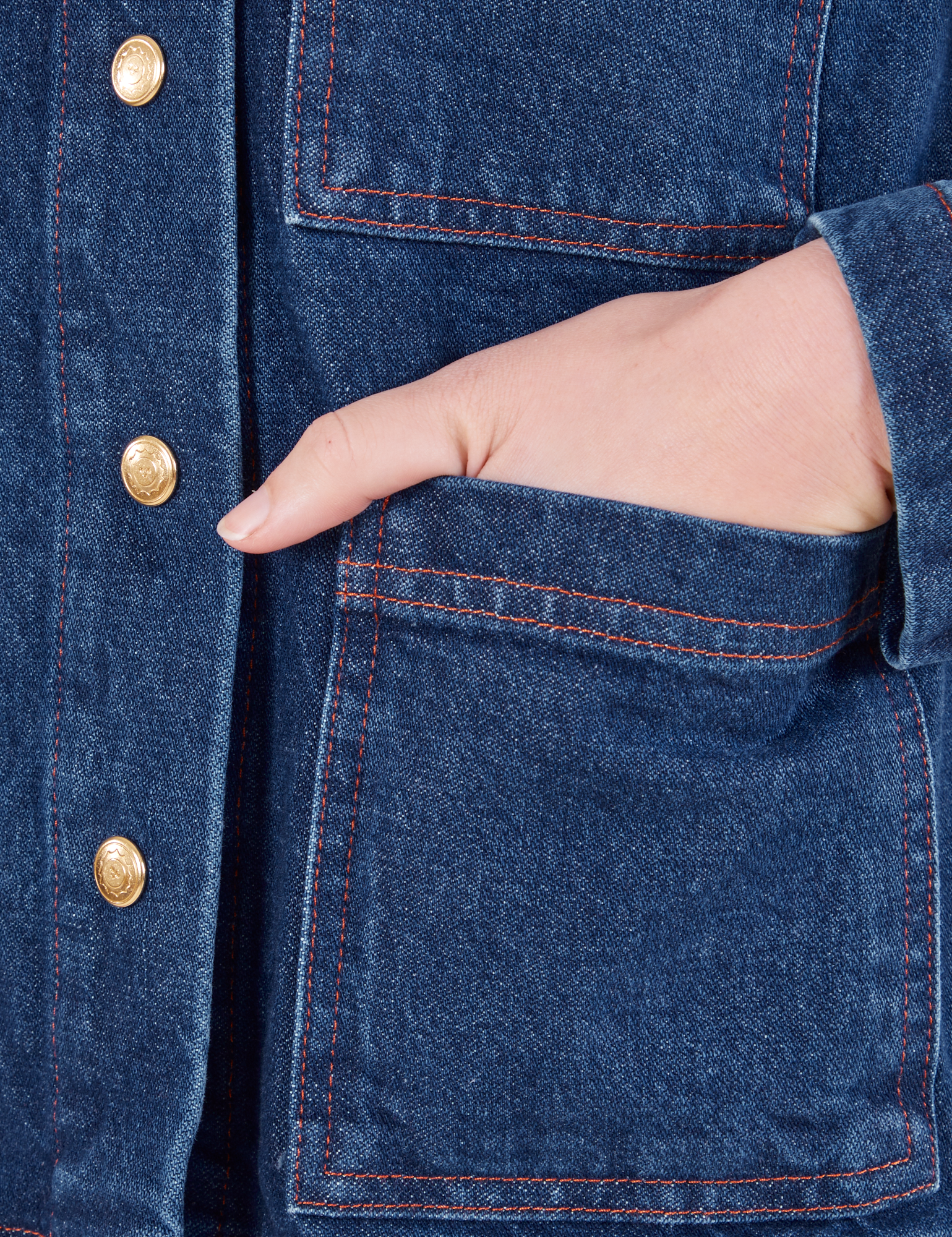 Indigo Denim Work Jacket in Dark Wash hand in front pocket