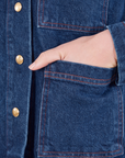 Indigo Denim Work Jacket in Dark Wash hand in front pocket