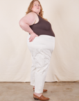 Side view of Western Pants in Vintage Tee Off-White and espresso brown Tank Top on Catie