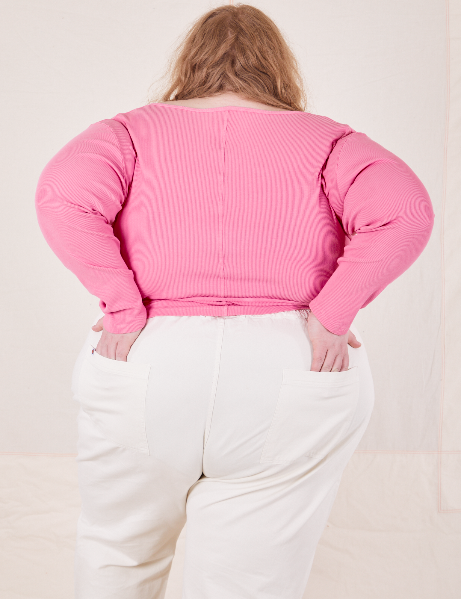Wrap Top in Bubblegum Pink back view on Catie wearing vintage tee off-white Western Pants