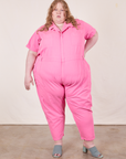 Catie is 5'11" and wearing size 5XL Short Sleeve Jumpsuit in Bubblegum Pink