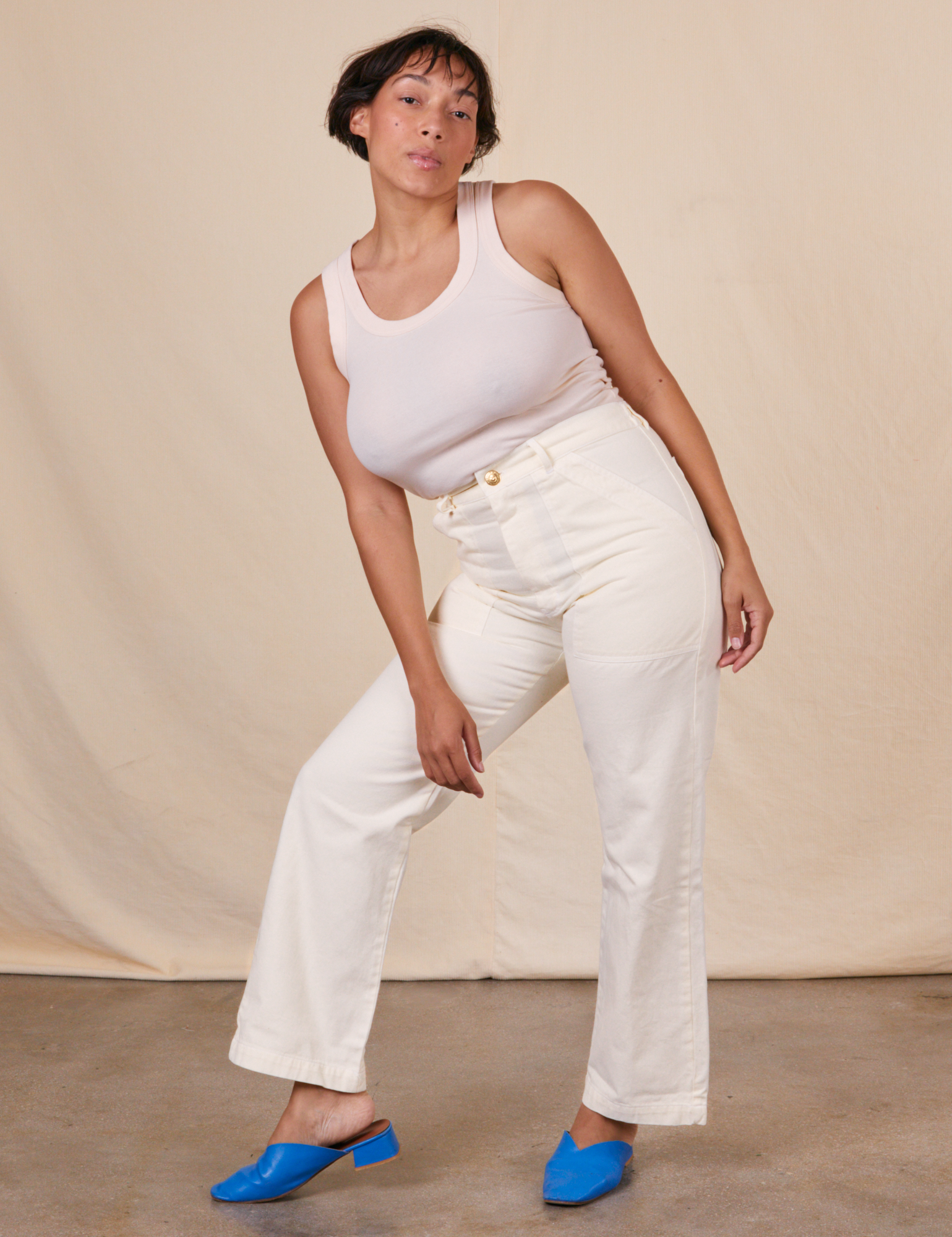 Tiara is wearing Work Pants in Vintage Tee Off-White and Tank Top