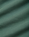 Essential Turtleneck in Emerald Green detail close up of knit fabric