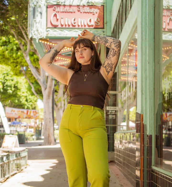 Sydney wearing Work Pants in Gross Green and Sleeveless Essential Turtleneck in Espresso Brown