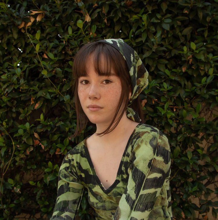 Hana wearing Work Pants, Long Sleeve V-Neck and Bandana from the Paintstamped Camo Collection
