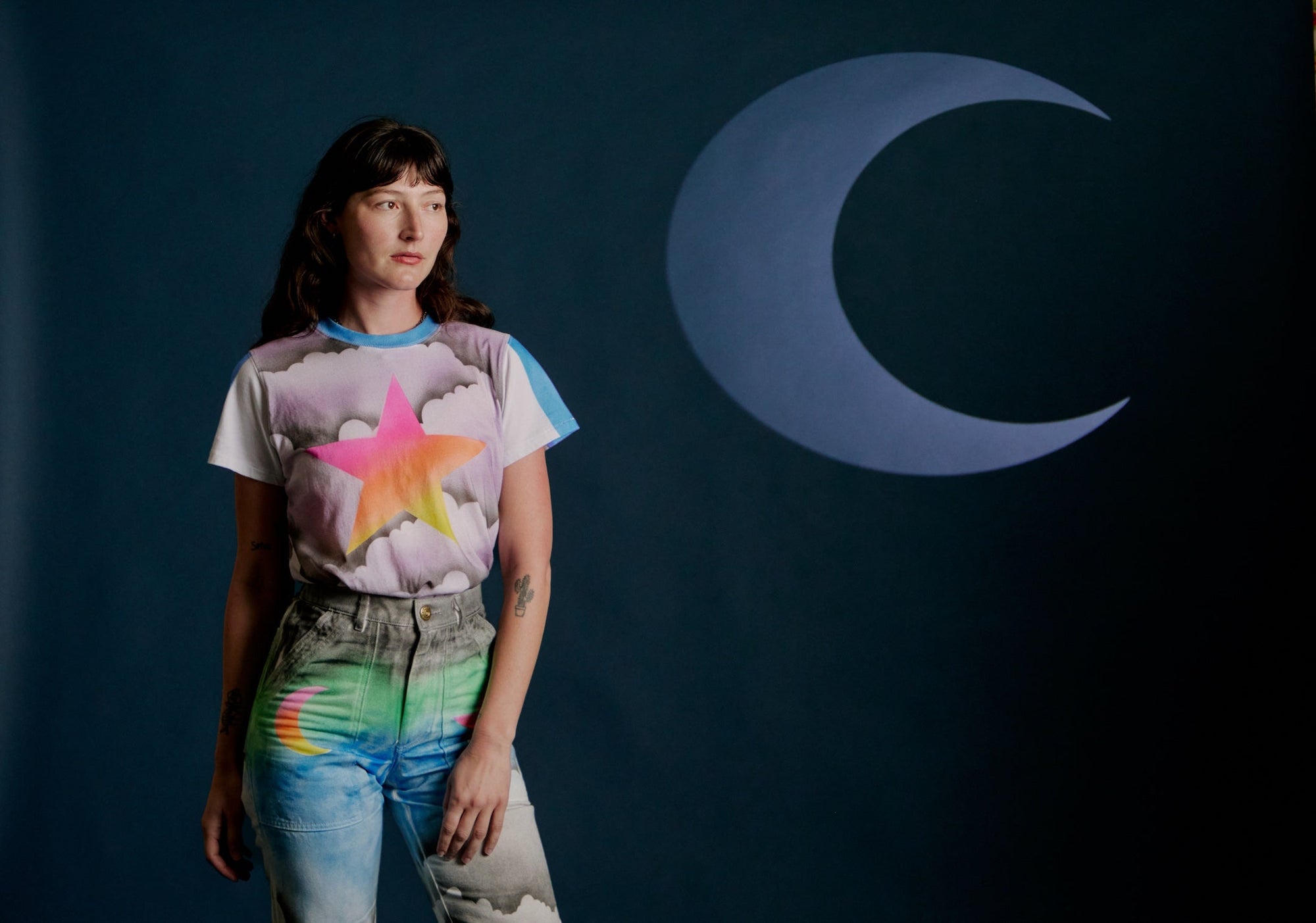Alexandra Skye is wearing Airbrush Star Vintage Tee and Work Pants in Night Sky Airbrush