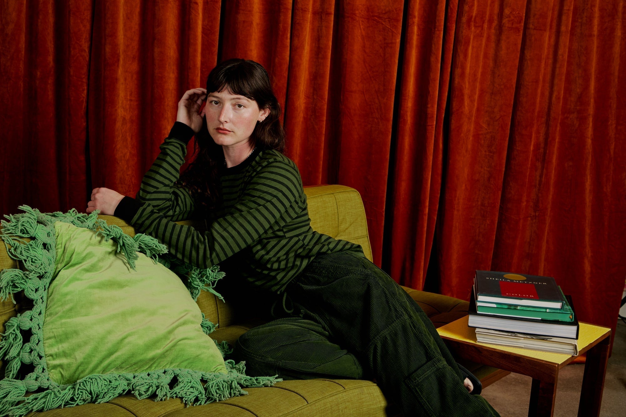 Alexandra Skye is wearing Long Sleeve Burly Tee in Evergreen/Black Stripe and Corduroy Drop Pocket Cargo Pants in Evergreen