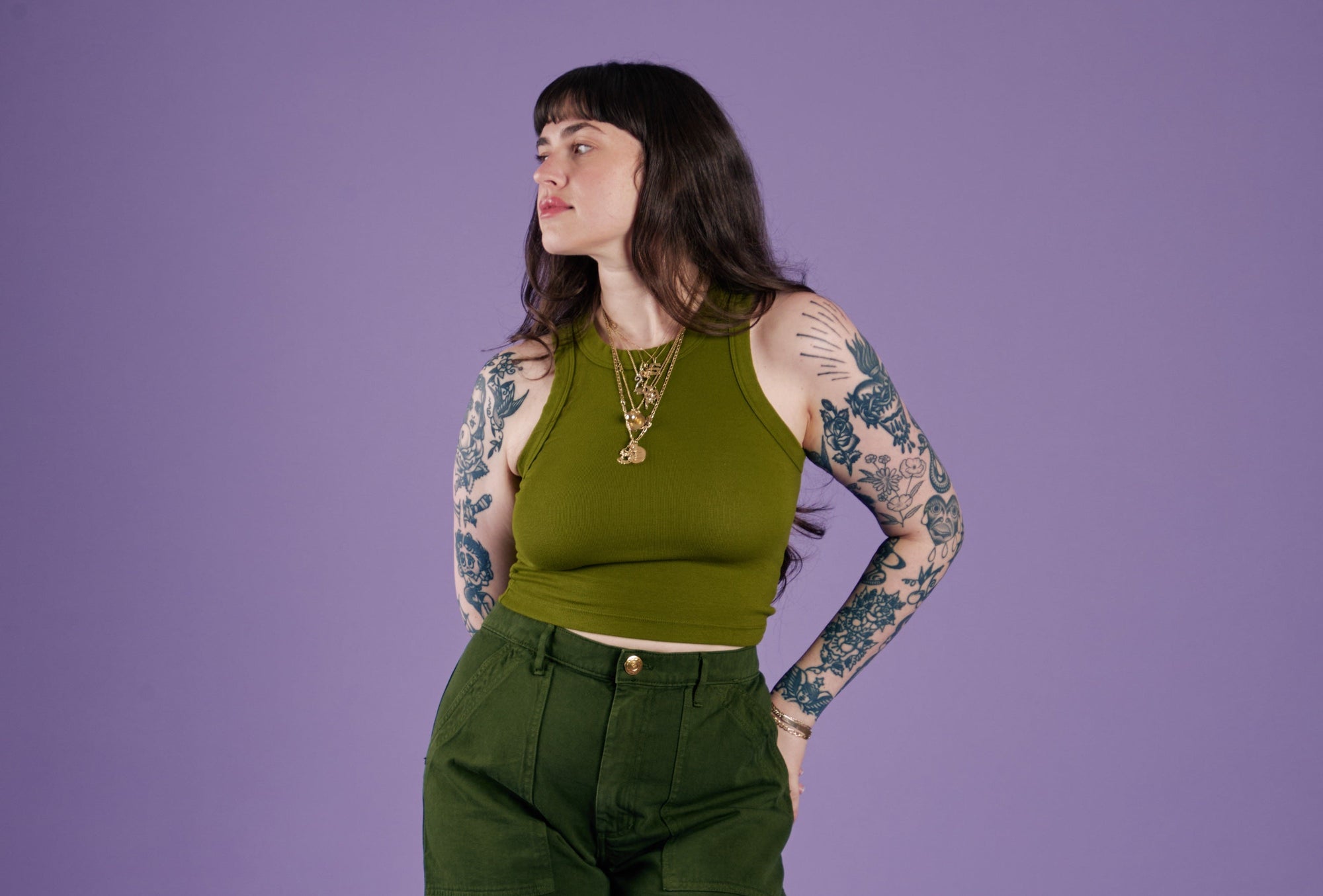 Sydney is wearing Racerback Tank in Summer Olive and Work Shorts in Evergreen