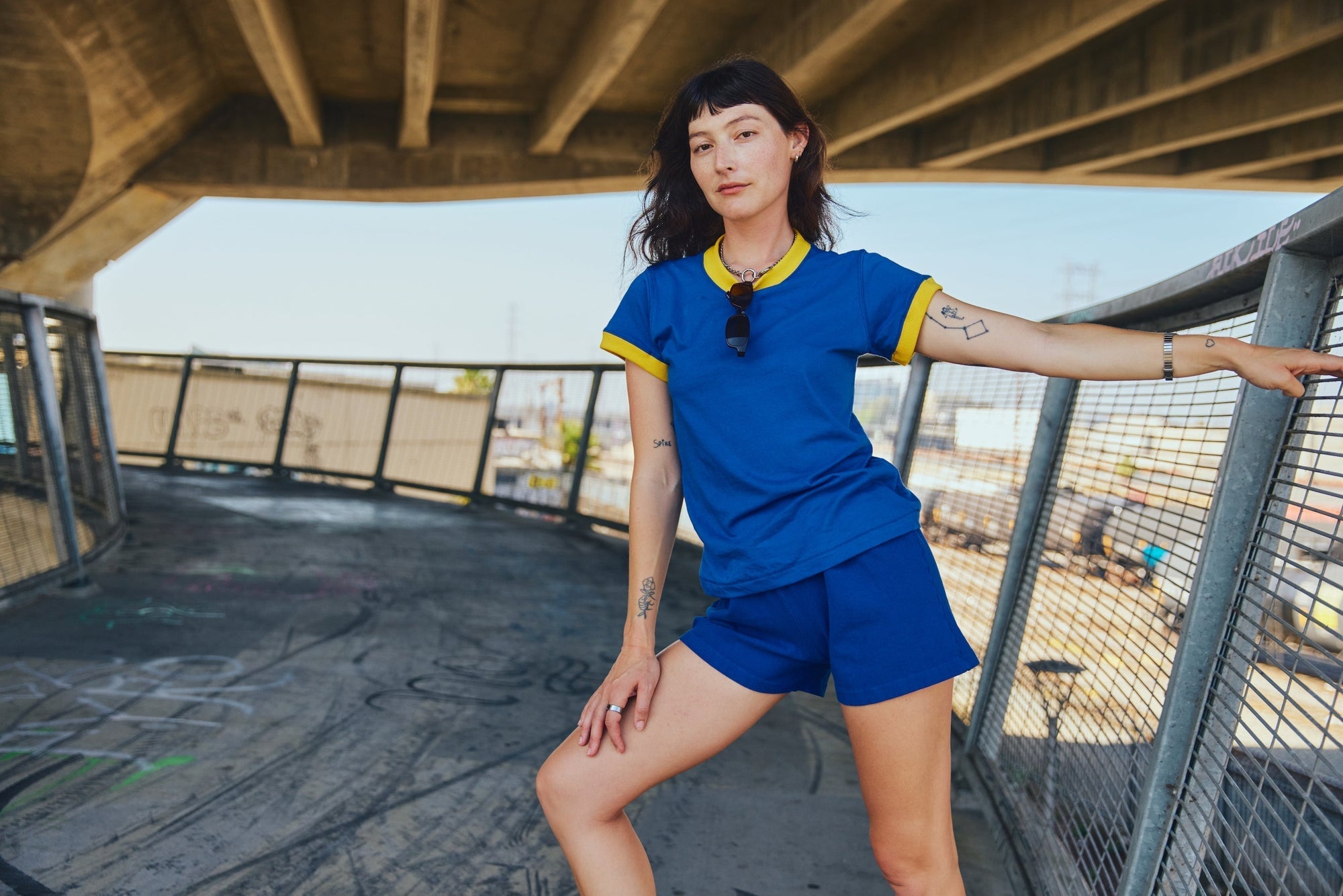 Alex is wearing Vintage Ringer Tee in Royal Blue and Athletic Shorts in Royal Blue