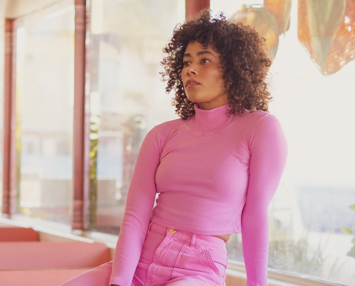 Shelby wearing Essential Turtleneck and Work Pants in Bubblegum Pink