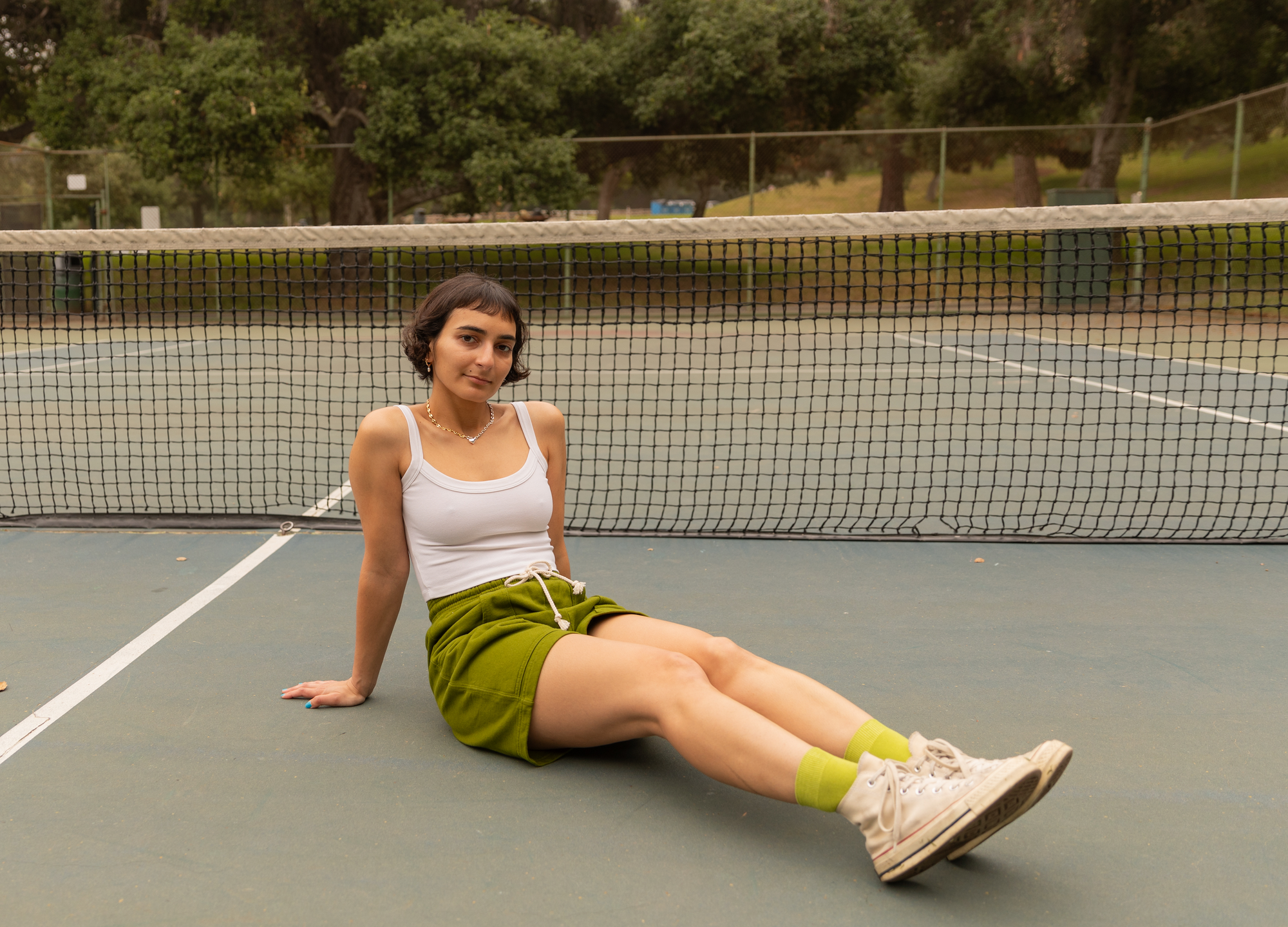 Soraya is wearing Cami in Vintage Tee Off-White and Lightweight Sweat Shorts in Summer Olive